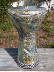 Egyptian doumbek decorated with colorful mother of pearl.