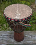 Rebuilt djembe drum with all new rope and a fresh African goatskin.