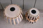 A tabla dayan and tabla bayan with fresh drum heads.