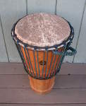 An ashiko drum with new rope and drums head.