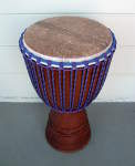 Rope-tuned African djembe hand drum.