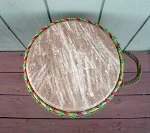Rope-tuned African djembe hand drum.