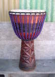 Djembe with new purple rope and fresh goat skin.