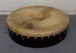 Irish bodhran with very old and used skin.