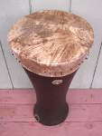 African peg drum with a fresh drum head.